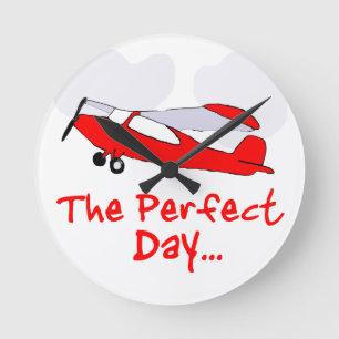 pilot flyling red airplane round clock