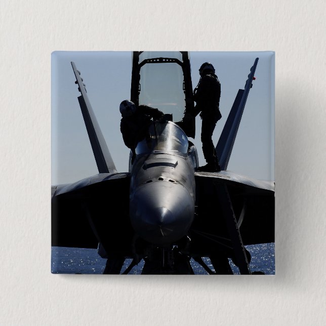 Pilots conducts a pre-flight inspection 2 inch square button (Front)