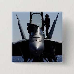 Pilots conducts a pre-flight inspection 2 inch square button