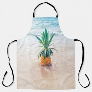 Pineapple fruit on beach shore in the morning apron
