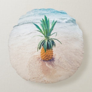 Pineapple fruit on beach shore in the morning round pillow