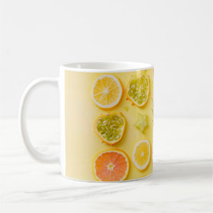 Pineapple surrounded by citrus fruits coffee mug