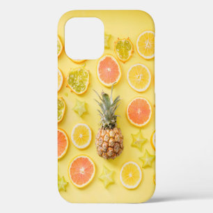 Pineapple surrounded by citrus fruits iPhone 12 case