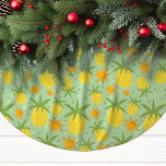 Pineapple Tropical Christmas<br><div class="desc">Brighten up your holiday decor with this cheerful Pineapple Tropical Christmas tree skirt. Made from soft brushed polyester, this vibrant design features golden pineapples and sun motifs set against a festive background. Perfect for adding a touch of tropical warmth to your Christmas tree, this unique tree skirt brings a fun...</div>