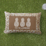 Pineapples Personalized Outdoor Lumbar Pillow<br><div class="desc">Three pineapples accent this outdoor lumbar pillow,  great for your home or a gift for a new homeowner personalized with your family name on a woven wood print pattern. (Not actual wood,  it is an illustration printed in full colour.)</div>