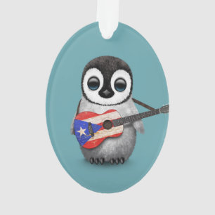 Pingouin de bébé jouant le bleu de guitare de