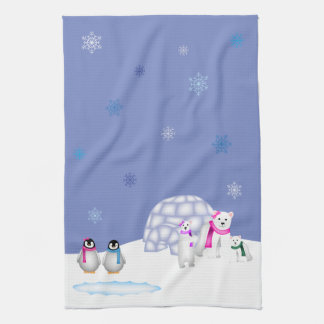 Pingouins et serviette de temps de jour d'ours