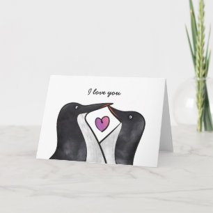 Pingouins sur carte amour