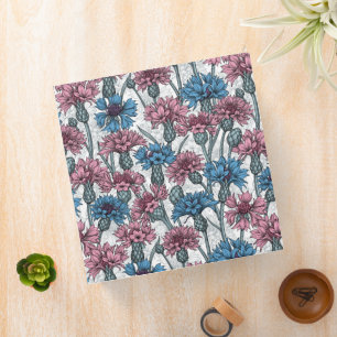 Pink and blue cornflowers, wild flowers on white binder