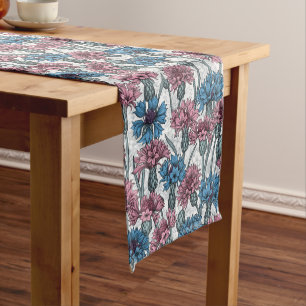 Pink and blue cornflowers, wild flowers on white short table runner