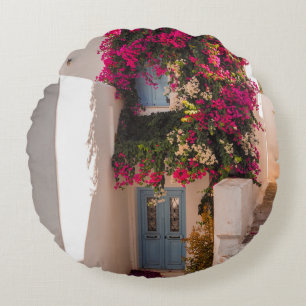 PINK AND GREEN PLANT ON WHITE CONCRETE WALL ROUND PILLOW