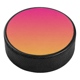 Pink and orange gradient hockey puck