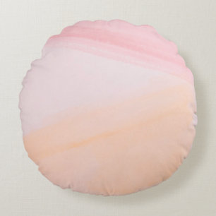 Pink and orange paints round pillow
