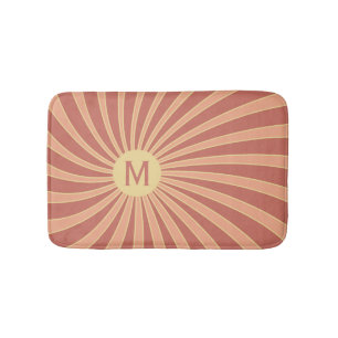 Pink and orange retro style sunburst design bath mat