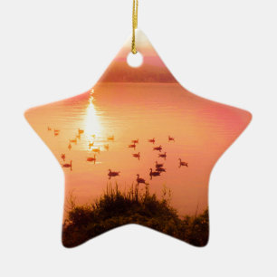 Pink and peach lake sunset ceramic ornament