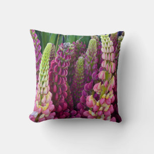 Pink and purple lupin flowers throw pillow