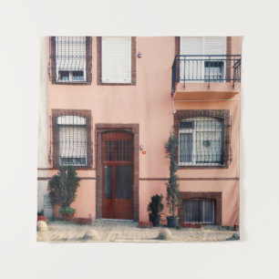 PINK AND RED CONCRETE BUILDING TAPESTRY