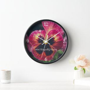 Pink and red pansy flower covered with raindrops clock
