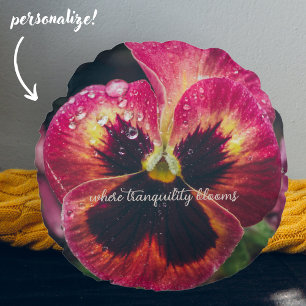 Pink and red pansy flower covered with raindrops round pillow