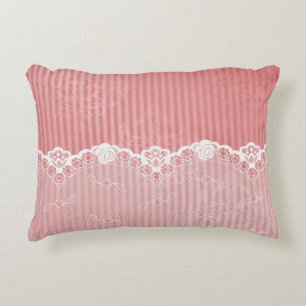Pink and white background with black lace accent pillow