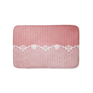 Pink and white background with black lace bath mat