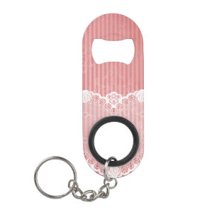 Pink and white background with black lace keychain bottle opener