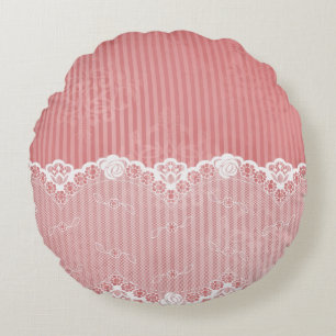 Pink and white background with black lace round pillow