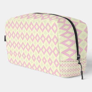 Pink and white diamond shapes on dopp kit