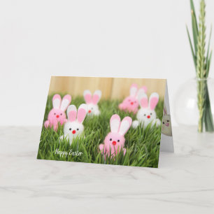 pink and white Easter bunnies in grass Card