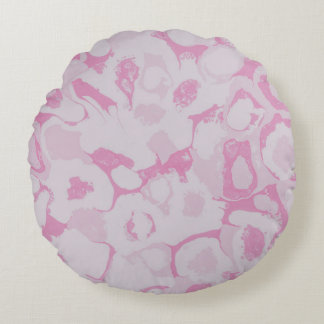 Pink and white floral textile round pillow