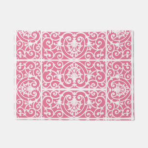 Pink and white scrollwork doormat