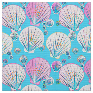 Pink and white sea shells on turquoise fabric