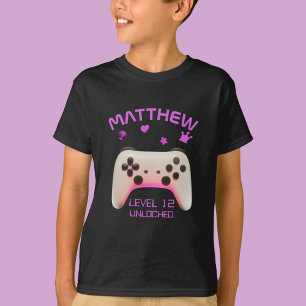 Pink and White Video Game Controller on Black T-Shirt