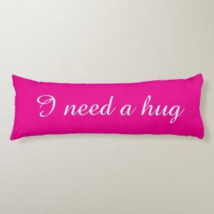 Pink body pillow with custom text I need a hug