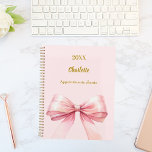 Pink bow 2026 planner<br><div class="desc">A soft blush pink background, decorated with a large bow. Personalize and add a year, name and text.</div>