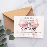 Pink bow cream birthday party Save the Date card<br><div class="desc">A modern and elegant Save the Date for a birthday party (any age).   A soft cream,  beige coloured background,  decorated with a large pink bow. Personalize and add date,  place,  name and age.</div>