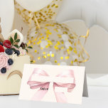Pink Bow Ivory Place Cards | Elegant Folded<br><div class="desc">A soft ivory colored background decorated with a large pink bow.  Perfect for birthday parties,  baby shower,  bridal showers,  Confirmations and First Communions.</div>