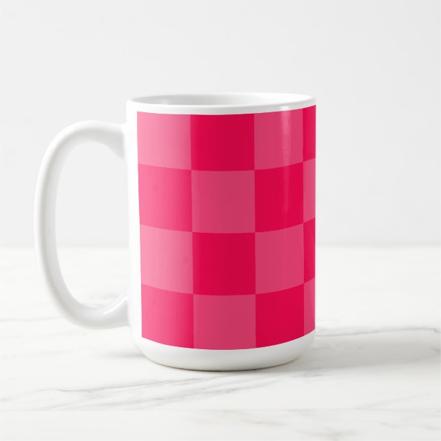 Pink chequered background coffee mug (Left)