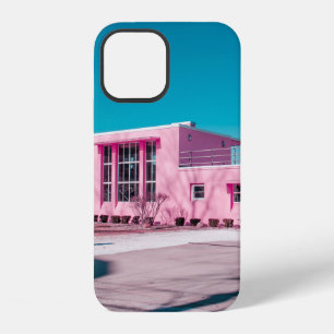 Pink concrete building under clear blue sky iPhone 12 case