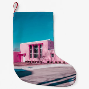 Pink concrete building under clear blue sky small christmas stocking