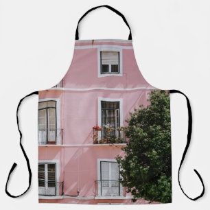 PINK CONCRETE COMMERCIAL BUILDING NEAR GREEN TREE APRON