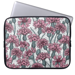 Pink cornflowers, wild flowers on white laptop sleeve