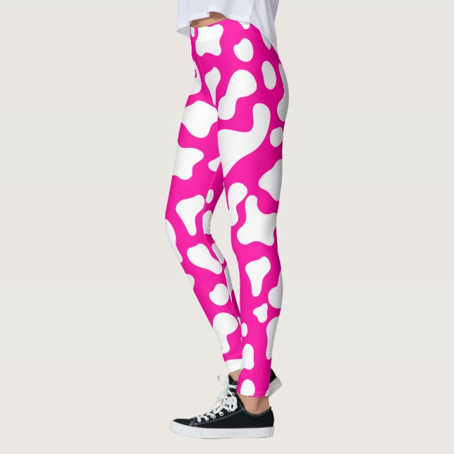Pink cow print leggings (Left)