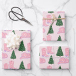 Pink Cowgirl Boots Hat Christmas Tree Wrapping Paper Sheet<br><div class="desc">Pink cowgirl rodeo Christmas design for the modern cowgirl. With a pink starry cowgirl hat,  pink starry cowgirl boots,  and a pine tree with star ornaments. Pink Christmas wrapping paper</div>
