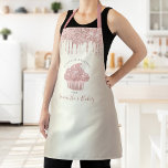 Pink Cupcake Glitter Drips Gold Bakery Pastry Chef Apron<br><div class="desc">Here’s a wonderful way to add to the fun of baking. Add extra sparkle to your culinary adventures whenever you wear this elegant, sophisticated, simple, and modern apron. A sparkly, rose gold cupcake, glitter drips, and dark grey handwritten typography overlay a faux metallic champagne gold ombre background. Personalize with your...</div>