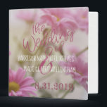 Pink Daisies Large Wedding Binder Romantic Flowers<br><div class="desc">Organize your wedding with this elegant Wedding Binder featuring pink daisies against a romantic unfocused background. The front of this Wedding Binder reads "the Wedding of" in dark pink script above your names in white, and the date in dark pink. The back of the Wedding Binder has text in dark...</div>