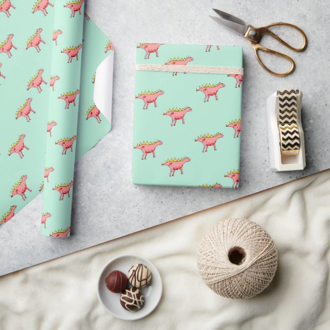 Pink dinosaurs pattern on pale blue wrapping paper (Crafts)