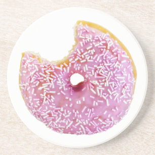 pink doughnut with a missing bite coaster