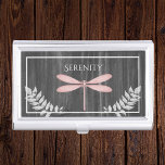 Pink Dragonfly Rustic Business Card Case<br><div class="desc">Keep your business cards on hand to pass out to potential clients or customers with a Pink Dragonfly Rustic Personalized Business Card Case. Case design features a vibrant dragonfly adorned with delicate foliage against a dark grey rustic wooden background. Additional gift items available with this design as well as a...</div>
