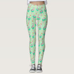 Pink Flamingo Ferns Tropical Green Summer Pattern Leggings<br><div class="desc">You'll be completely one-of-a-kind in these unique tropical flamingo leggings. Inspired by retro, stylized Art Deco motifs and themes from the Jazz Age, these all-over-print leggings have an original pink flamingo bird pattern with colourful ferns and geometric shapes. The design is made in shades of bright summer green with peachy...</div>